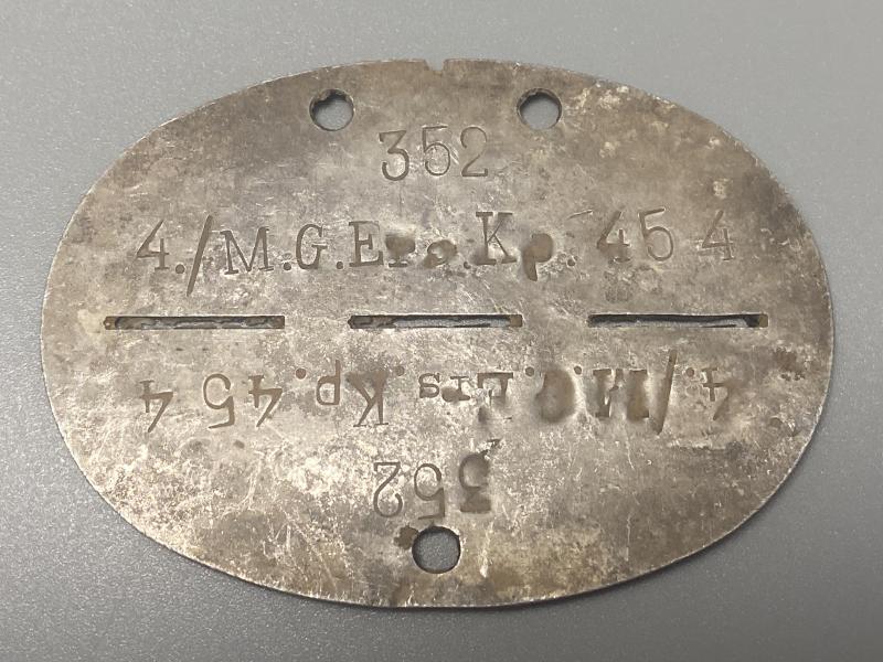WWII German Army ID Disc – 4./M.G. Ersatz Kompanie 454