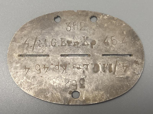WWII German Army ID Disc – 4./M.G. Ersatz Kompanie 454