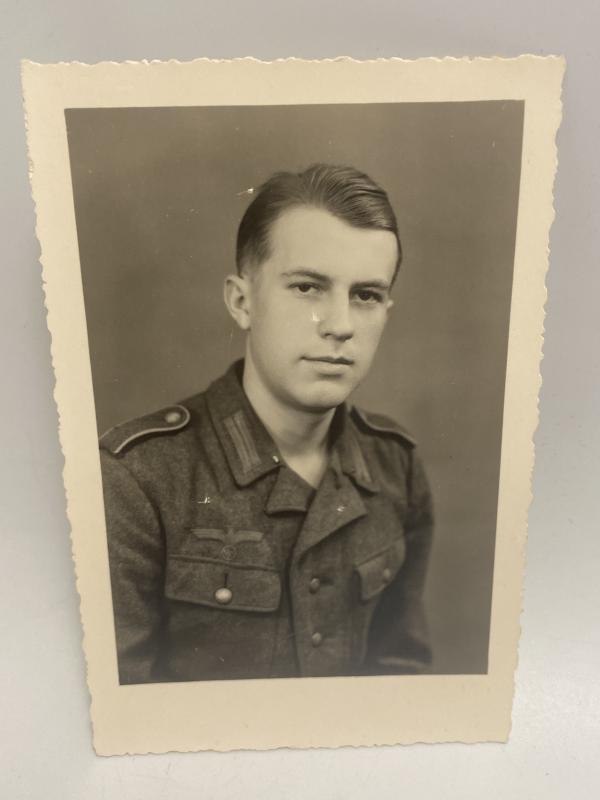 WWII German Army Soldier in M44 Field Uniform – Original Postcard-Size Studio Portrait, Dated 1944