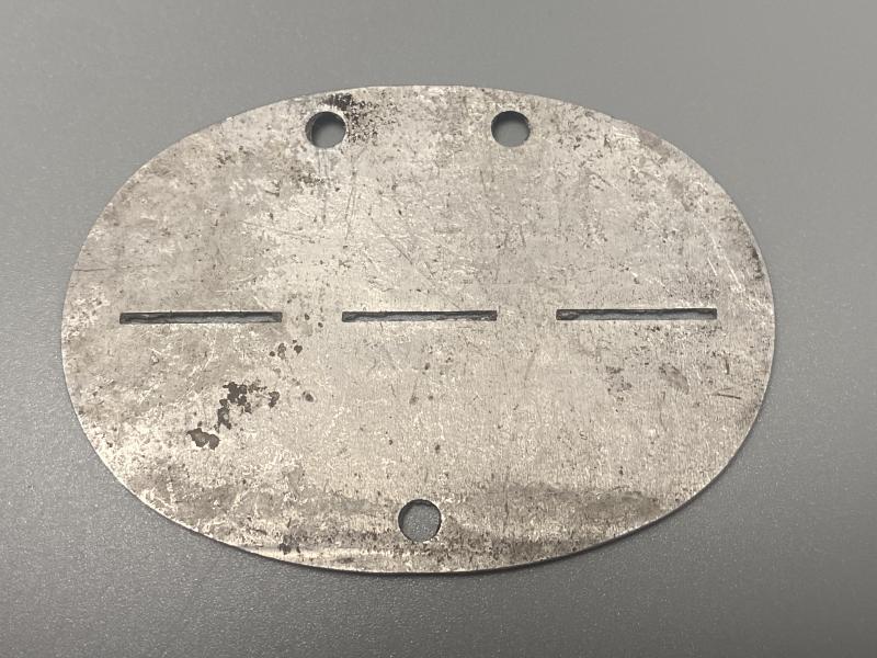 WWII German Army ID Disc – 4./M.G. Ersatz Kompanie 454